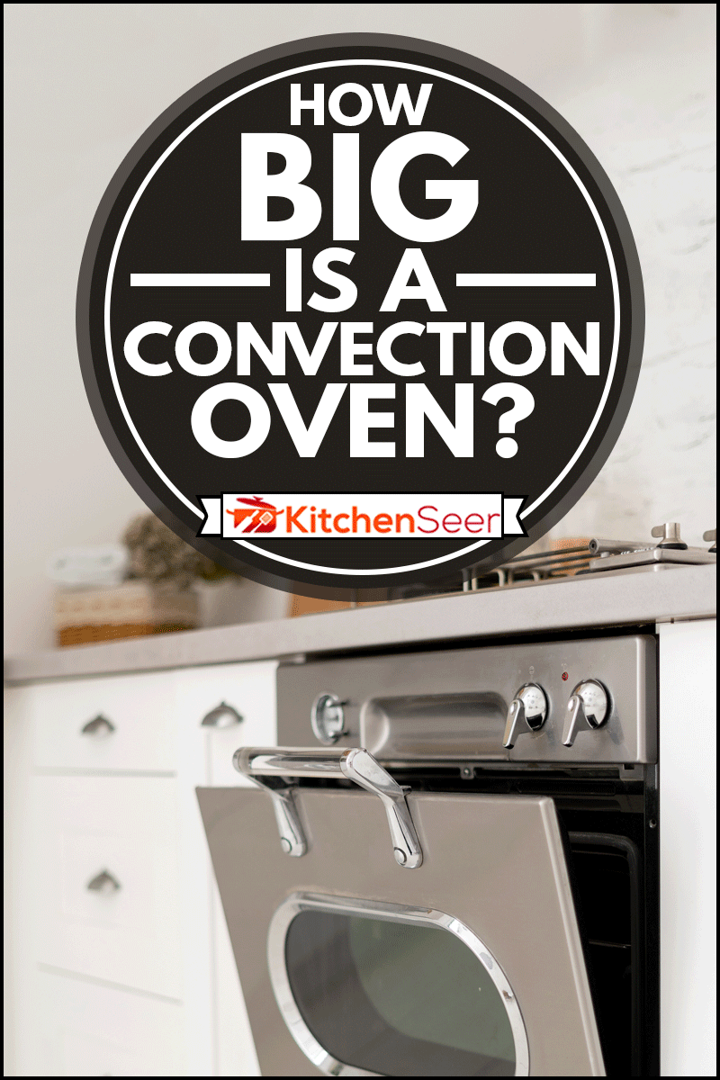 现代厨房的元素，现代的室内风格和内置的烹饪器具，bd手机下载对流烤箱有多大?＂width=