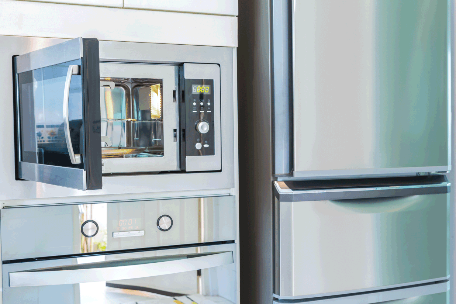 现代厨房不锈钢bd手机下载抛光微波炉和冰箱