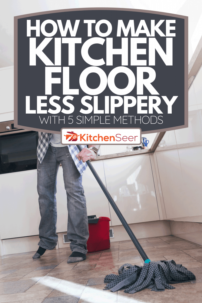 一个男人在厨房拖地的低角度视角，如何让厨房地板不那么滑[用5个简单的方法]bd手机下载