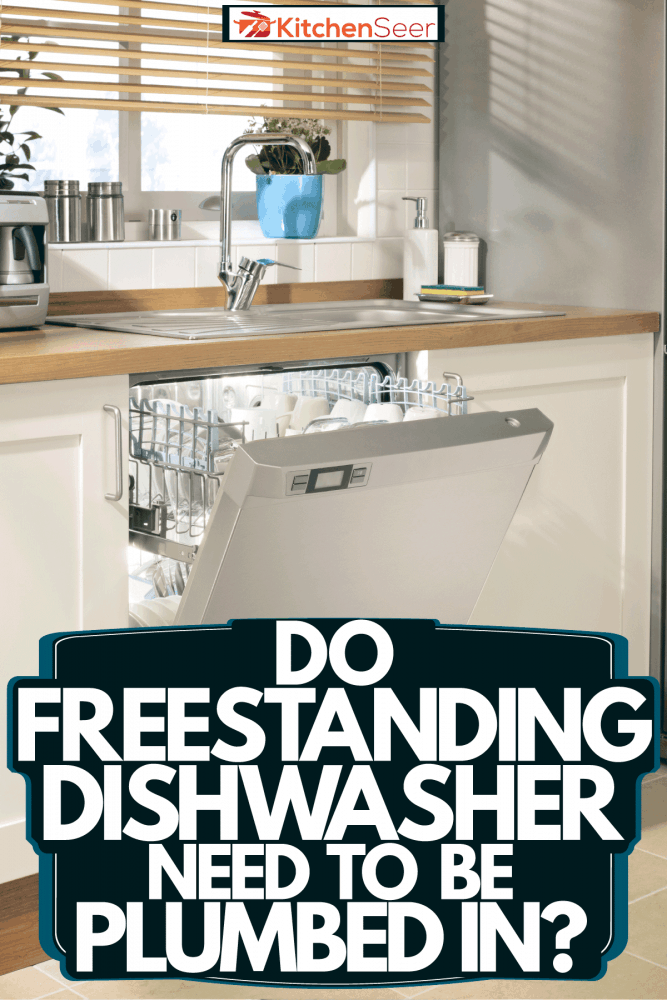 一个打开的洗碗机有很多杯子和其他厨房用具，独立的洗碗机需要管道吗?bd手机下载＂width=