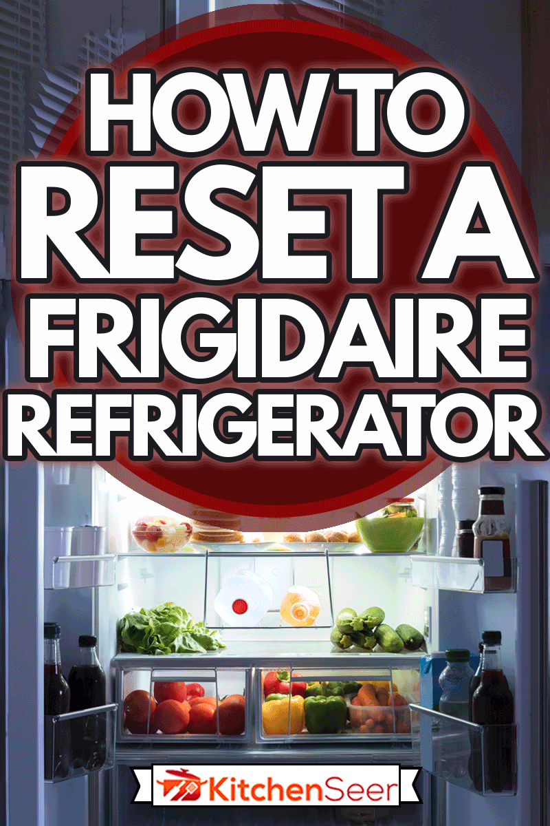 在厨房里打开装满果汁和新鲜蔬菜的冰箱，如何重置冰箱bd手机下载＂width=