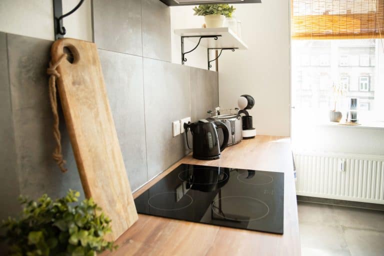 极简主义和现代厨房用黑色感应炉灶面启发,可以用于感应炉灶面酷彩吗?bd手机下载
