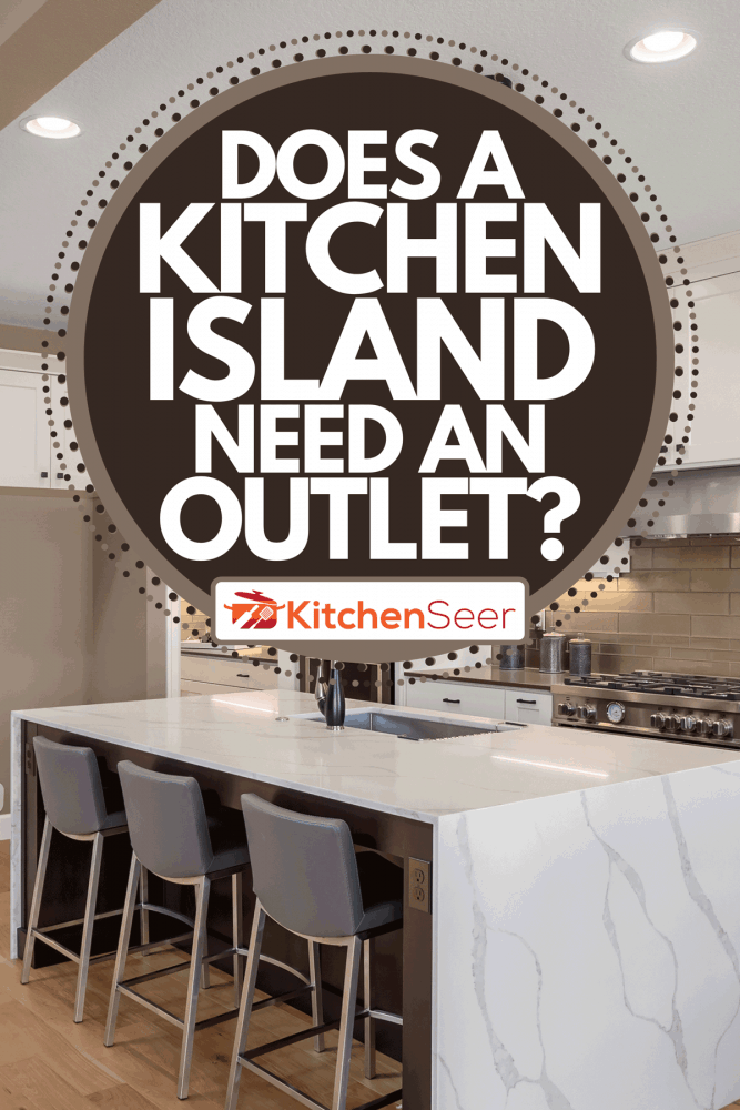 一个漂亮的厨房在新家，岛bd手机下载，吊灯，和硬木地板，厨房岛需要一个出口吗?