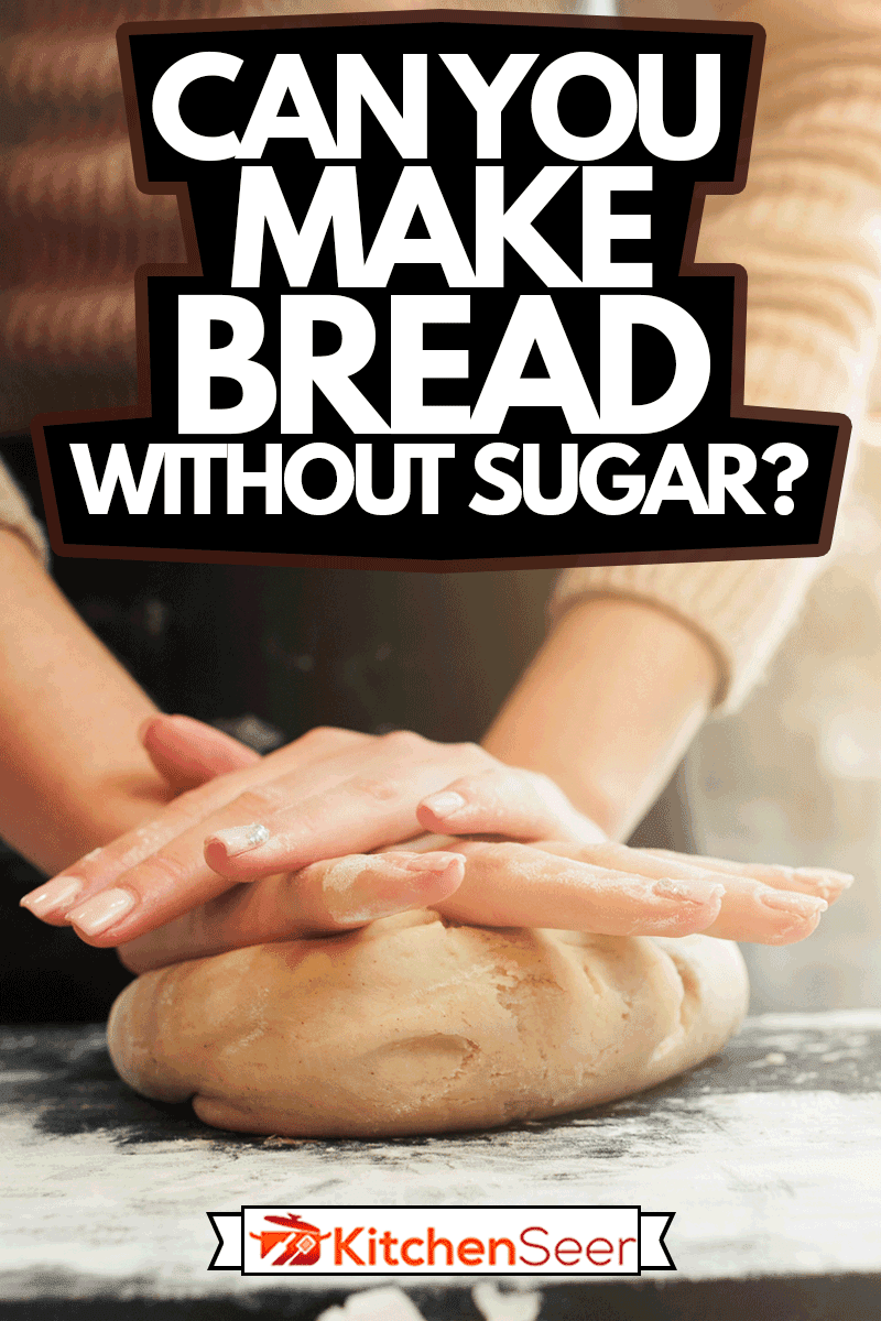 女性的手揉面，日落背景，你能做没有糖的面包吗?
