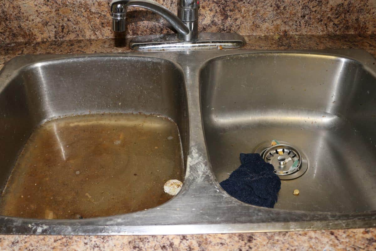 肮脏的厨房水槽bd手机下载,你能使用洗涤剂在垃圾处理?
