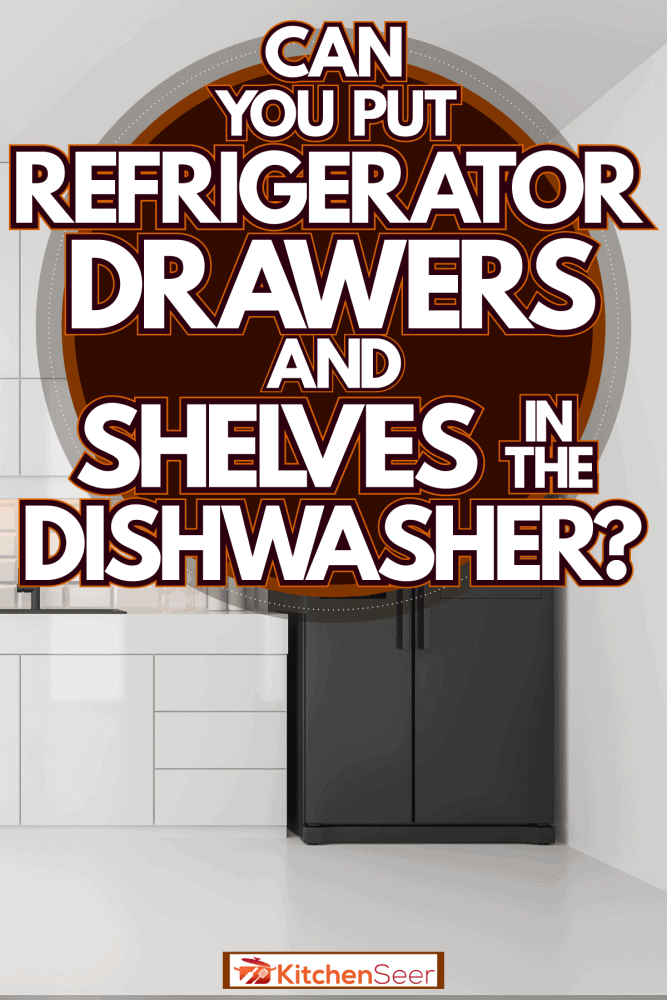 白色厨房里有一个黑色的冰箱，里面有铝制橱柜和橱柜，你能把冰箱抽屉和架子放bd手机下载进洗碗机吗?