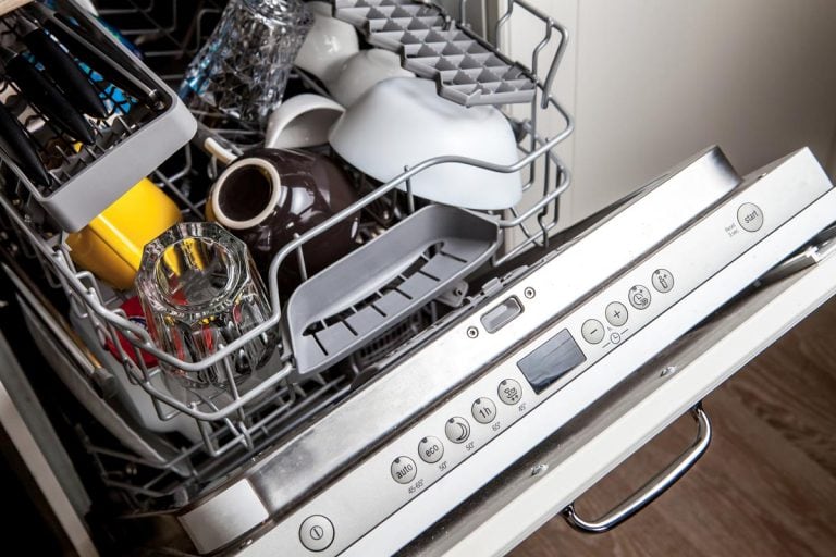 洗净的盘子放进洗碗机机器洗涤周期后,通用电气洗碗机应该运行多长时间?[公司。在正常)