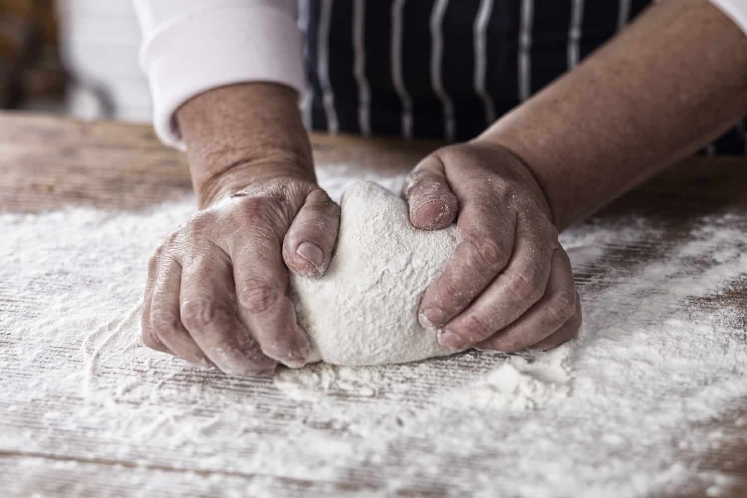 Kneading yeast dough.