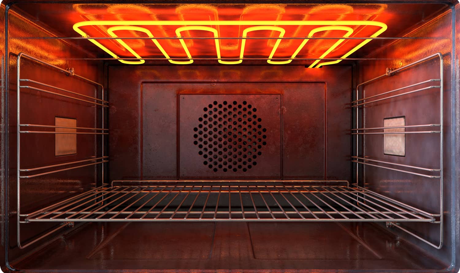 一个近距离的观点，通过内部的空热操作家用烤箱与发光元素和金属架