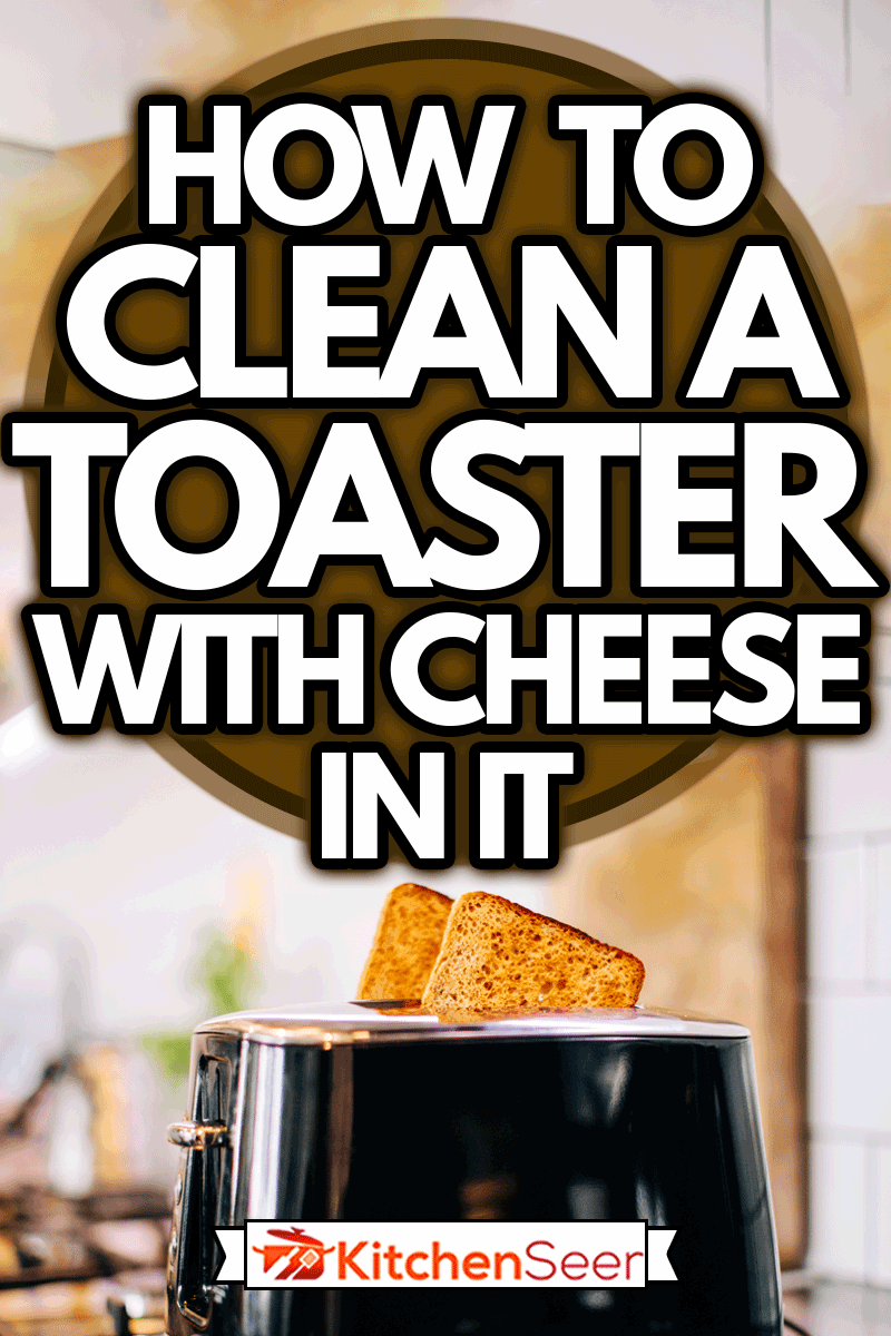 吐司从厨房的黑色烤面包机里蹦出来，如何清洁有奶酪的烤面包机bd手机下载