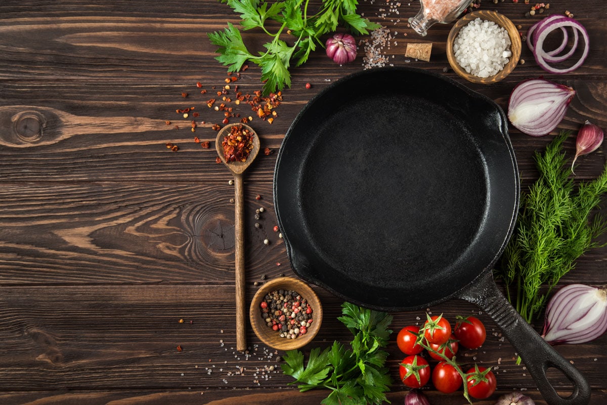 herbs-spices-around-cast-iron-skillet